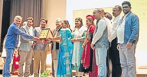 The research team of IHRD’s Model Engineering College, Kochi, being handed over the chip fabricated at SCL, Punjab, by Union Minister for Electronics & IT Ashwini Vaishnav 