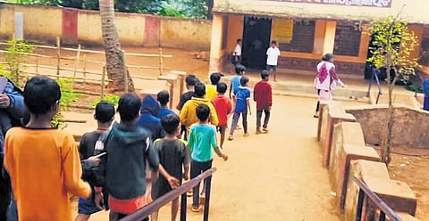 The students being escorted back to Lankaput school on Monday 