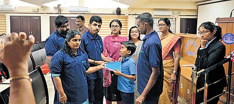 Children from the Jeevaniyam Autism Hospital and Research Centre with Assistant Collector Parvathy Gopakumar 