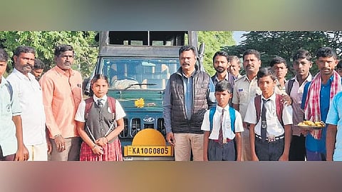 Forest officials arrange a safari vehicle to ferry schoolkids who had to walk 14 km to reach school in Pachedoddi village in Hanur taluk of Chamarajanagar district 