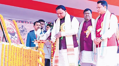 Chief Minister Mohan Charan Majhi lighting the lamp at the event on Sunday 
