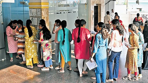 Arjun Pandian interacts with students in Namaste Collector programme