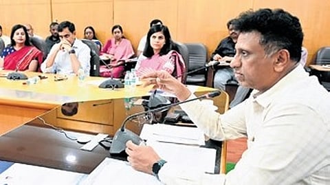 Minister MC Sudhakar launches the logo for the Career 2 Campus Summit on Wednesday.