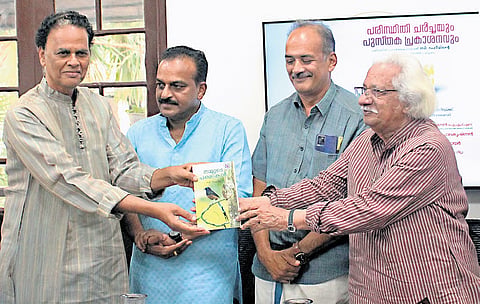 Filmmaker Adoor Gopalakrishnan presents the first copy of ‘Nammude Pakshikal’ to Achuthsankar S at Forest Central Library, Nandavanam, on Thursday. Also seen are Chief Wildlife Warden and Additional Principal Chief Conservator of Forests Pramod G Krishnan and the book’s author C Rahim.