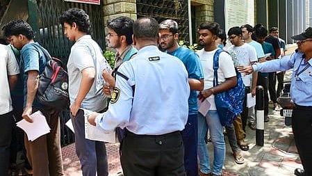 Bengaluru: Students undergo security check as they arrive to appear for the National Eligibility cum Entrance Test (NEET-UG) 2026 at an examination centre in Bengaluru on Sunday, May 3, 2026. 