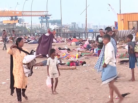 Sweltering Mumbai heat drives Versova residents to sleep on the beach at night