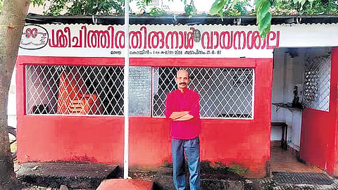 P Ravindran in front of Sri Chithira Thirunal Vayanashaala