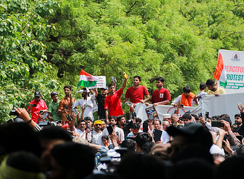 Children, students brave rain, tear gas at CJP's Parliament march