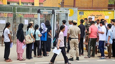 New Delhi: Candidates stand in a queue before entering Gargi Sarvodaya Kanya Vidyalaya ahead of the NEET UG 2026 re-exam at Green Park in New Delhi on Sunday, June 21, 2026. (Photo: IANS/Prem Nath Pandey)