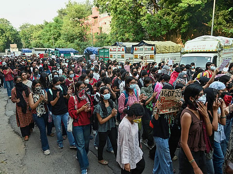 Priyanka Gandhi stands with students protesting over women’s safety