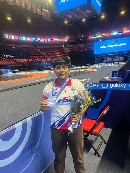 Amruta Pujari wins silver in women