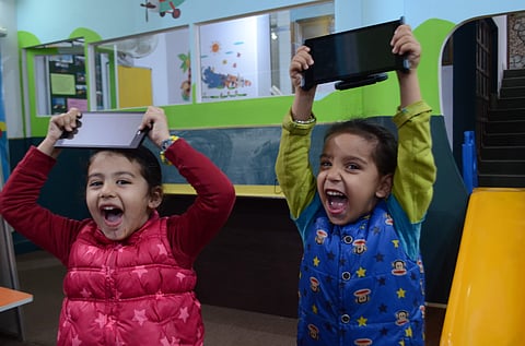 Kids with their tablets