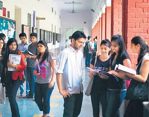 A section of students condemned the varsity's move to make the written examination a mere qualifier
