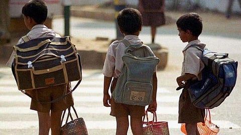 Students studying in higher classes carry books that go up to 60 kg, including workbooks and study materials (representative image) | AFP