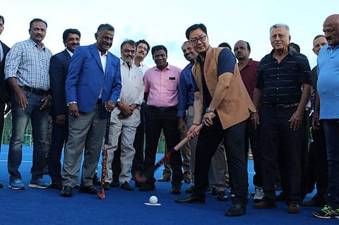 Kiren Rijiju tries his hand at hockey at the new Astro Turf at the CSS (Pic: Rakesh Kumar/EDEX)
