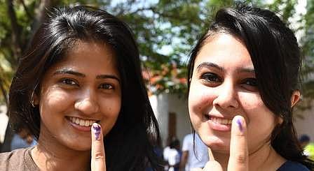 Young voters show their inked finger at a polling station in Malleshwaram in Bengaluru  (Pic: Pushkar V/ Express)