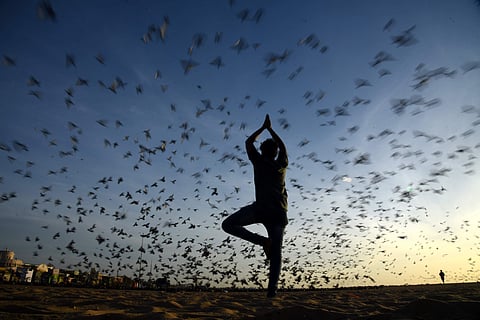 Mahendra reaches the Marina Beach at 5.30 am every day for his daily dose of yoga (Pic: R Satishbabu)
