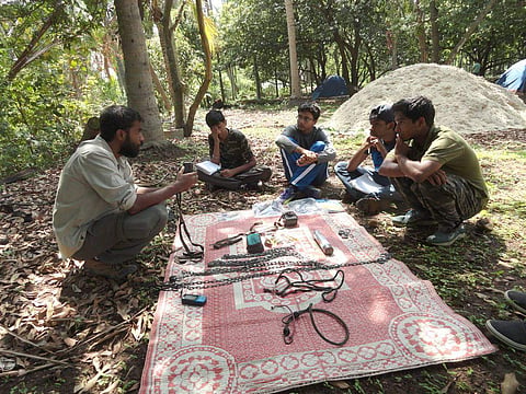 A Rocha volunteer educating students about various devices that are used to track the path of elephants (Picture: A Rocha India)
