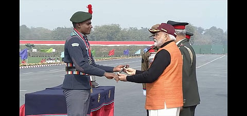 Gaffney Jerel receiving the prestigious baton