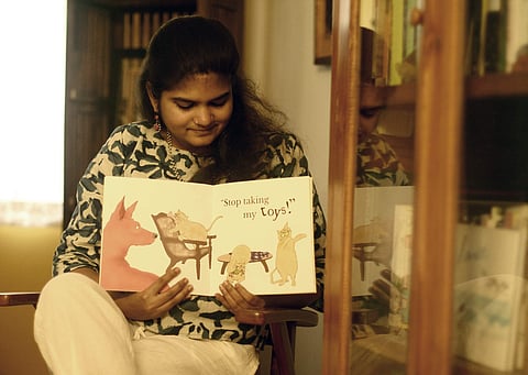 Nivedhita Subramaniam with one of her books