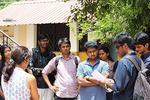 Adarsh Ramesh along with his team members of ReachOut. It includes college students mainly