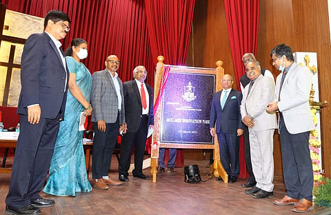 KM Mammen, Principal Wilson and other dignitaries unveil the plaque