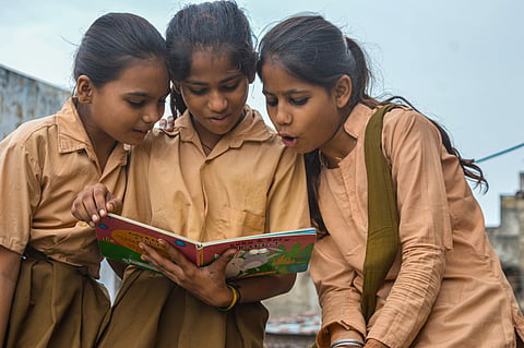 Share A Book India Association is setting up libraries in government and low-income schools to ignite the love for reading | Pic: SABIA