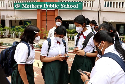 Students checking their results image for representation only | (Pic: Express)