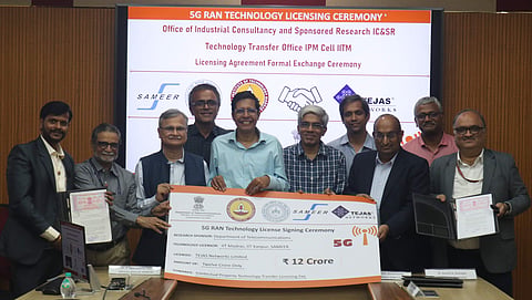 IIT Madras, IIT Kanpur and SAMEER officials display the cheque replica | (Pic: IIT Madras)