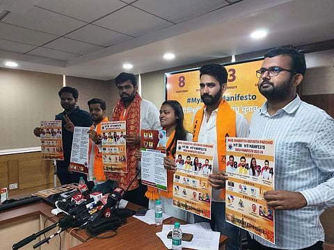 ABVP DUSU candidates with election manifesto | (Pic: Official X handle of ABVP Delhi)