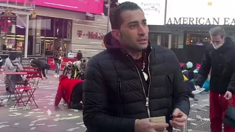  man tossing money