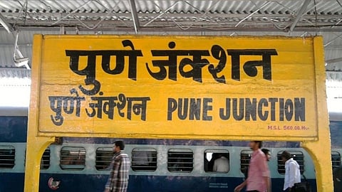 why are railway station names always written on yellow board know very interesting reason behind it  
