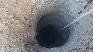 seven year old boy fell into a borewell