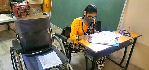 divyang student giving 12 exam paper Pimple Gurav