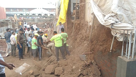 Body found under mound soil construction worker killed others injured 