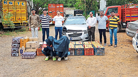 criminal arrested with seized liquor 