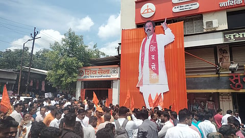 Shiv Sainiks gathered outside the Shiv Sena office.