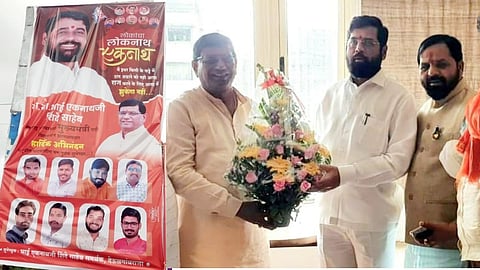 Former Shiv Sena MLA Dr Shashikant Khedekar wish cm Eknath Shinde remove banner of uddhav thackeray and put eknath shinde banner 

