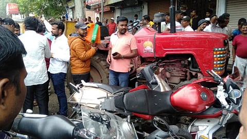 Thrilling tractors on  road at upper last bus stand