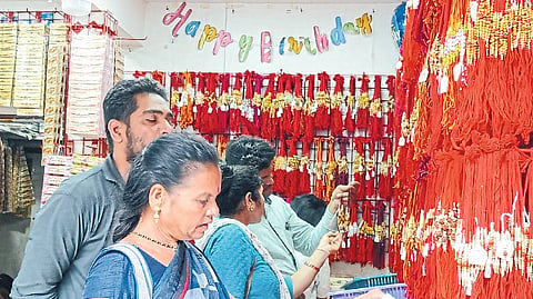 Women buying rakhi.