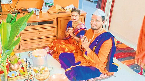Newly married couple worshiping the festival of Kanbai Mata.