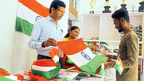 The market is decorated with tricolor colored turbans, caps etc. and the rush to buy the tricolor flag is going on.