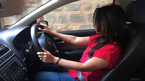 Woman driving Car