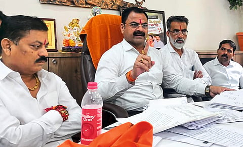 MLA Kishore Patil while giving information along with documents in a press conference regarding municipal plot reservation