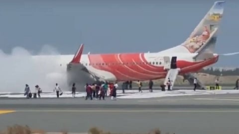 air india express plane passengers evacuated after smoke and fire muscat to cochin flight 