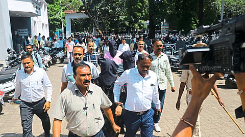 Police bringing PFI suspects detained by ATS team to court.