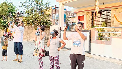 Balgopal watching the Khandgras solar eclipse.