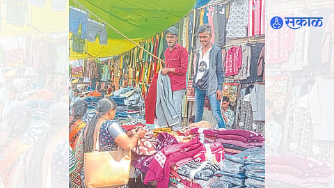 Women shopping for sweaters.