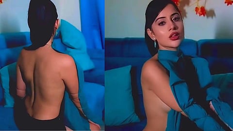 Urfi Javed goes backless as she flaunts her unique way of wearing a shirt; netizens react
