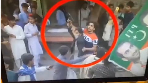viral video of a boy who saved imran khan getting praised on internet imran khan firing  